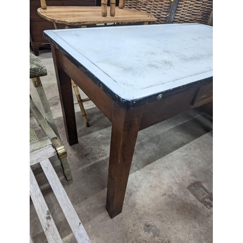 1131 - An enamel top kitchen table, width 105cm, depth 63cm, height 68cm