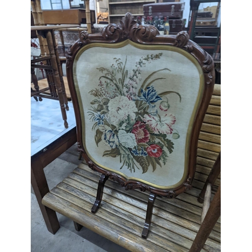 1132 - An elm and beech stool together with a Victorian rosewood tapestry firescreen