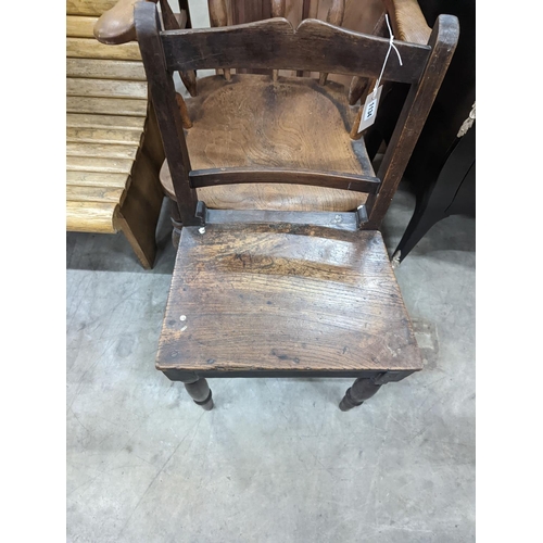 1134 - A Victorian elm and beech smoker's bow chair together with a provincial wood seat chair