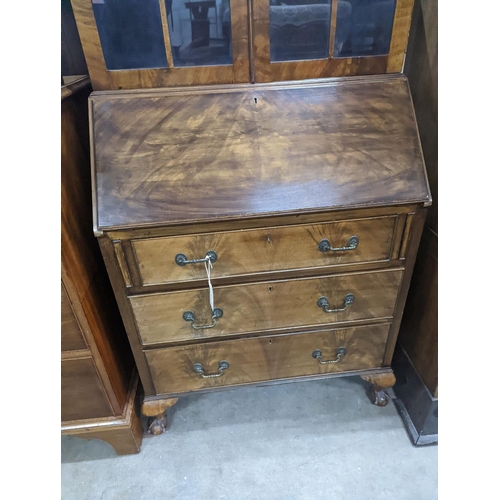 1147 - An early 20th century walnut bureau bookcase, width 77cm, depth 45cm, height 205cm