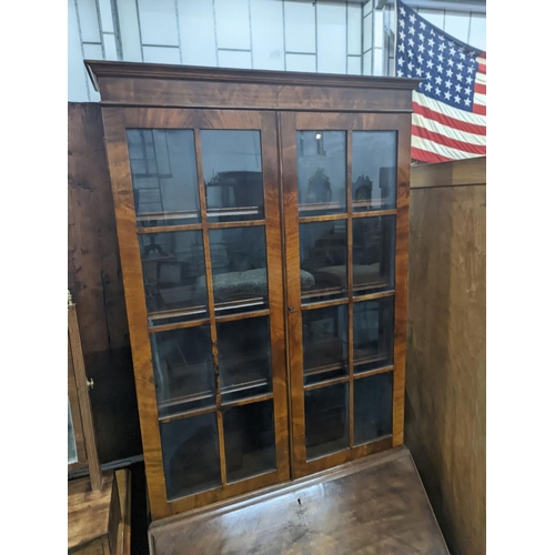 1147 - An early 20th century walnut bureau bookcase, width 77cm, depth 45cm, height 205cm