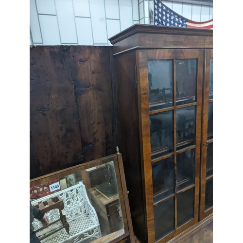 1147 - An early 20th century walnut bureau bookcase, width 77cm, depth 45cm, height 205cm