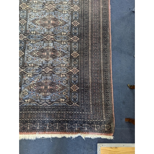 1169 - A Bokhara blue ground rug, 190 x 30cm