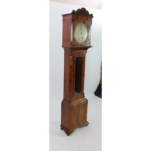 1171 - Rainforth & Son of Bridgewater. An early 19th century mahogany domestic regulator,with foliate carve... 