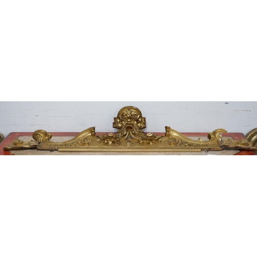 1177 - A 19th century carved giltwood pediment, width 142cm