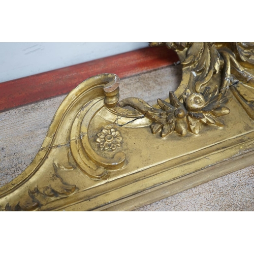 1177 - A 19th century carved giltwood pediment, width 142cm