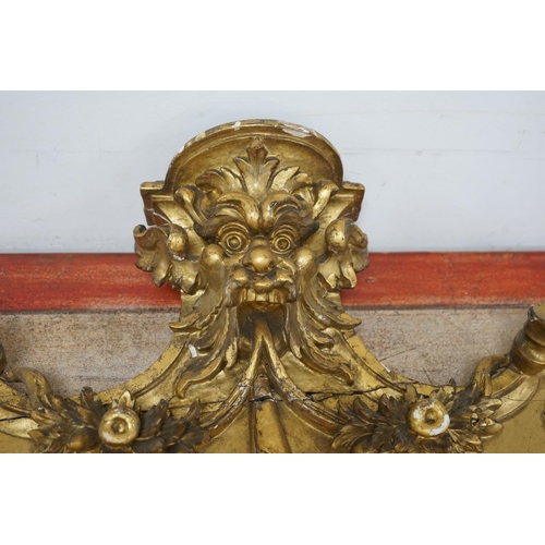 1177 - A 19th century carved giltwood pediment, width 142cm