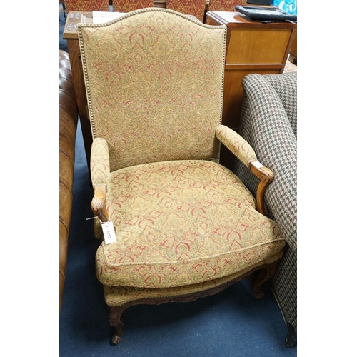 1192 - An 18th century style French walnut upholstered open armchair, width 68cm, depth 60cm, height 108cm... 