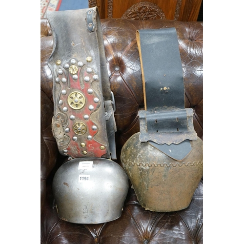 1194 - Two large French or Swiss vintage cow bells, larger 26cm, height 22cm