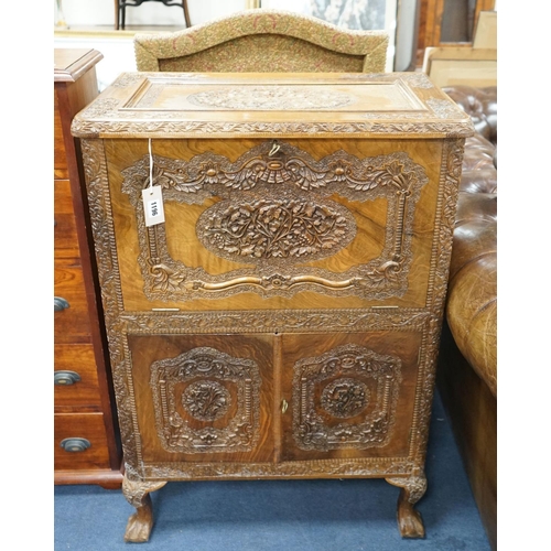 1196 - A Kashmiri carved hardwood cocktail cabinet, width 67cm, depth 42cm, height 96cm