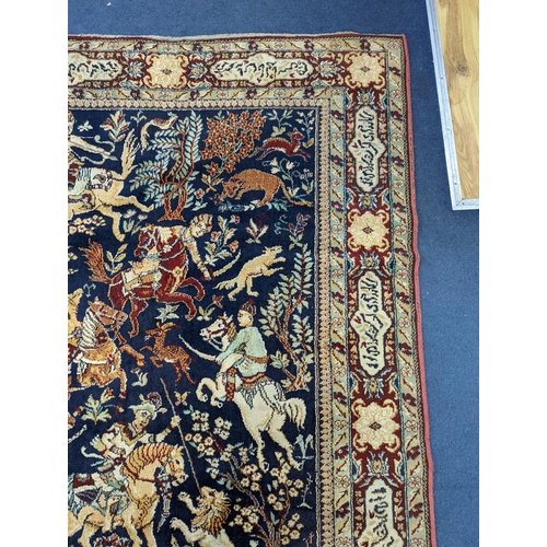 1207 - A Kashan style blue ground pictorial rug, 224 x 144cm