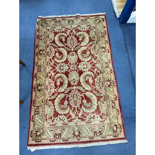 1208 - A Zeigler red ground rug, 160 x 100cm