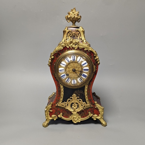 1254 - A Louis XV style ormolu mounted scarlet Boulle eight day mantel clock with key and pendulum 34cm... 