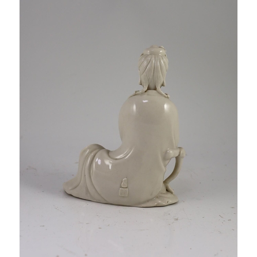 1255 - A Chinese blanc-de-chine seated figure of Guanyin, Dehua kilns, 19th/20th century,holding a ruyi sce... 