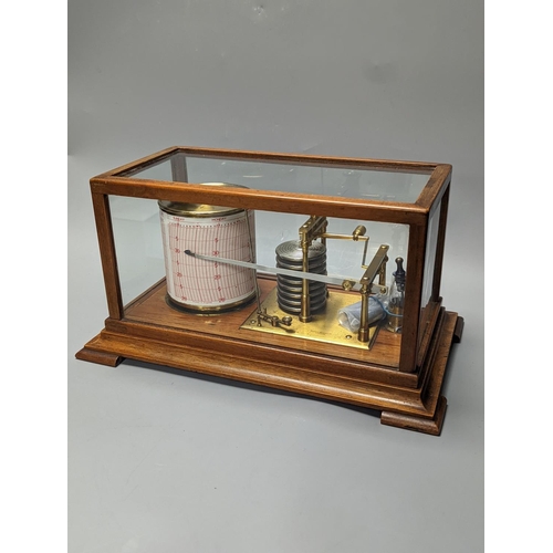 1263 - A Short & Mason oak cased barograph with spare graph paper