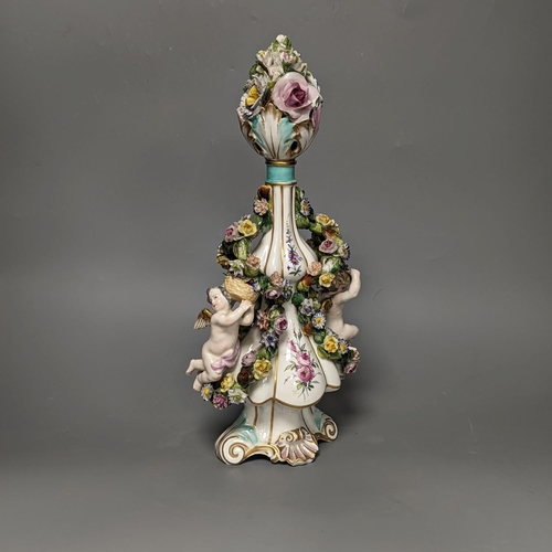 1266 - A German  porcelain floral encrusted vase and cover 35cm, pseudo crossed swords mark