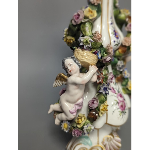 1266 - A German  porcelain floral encrusted vase and cover 35cm, pseudo crossed swords mark