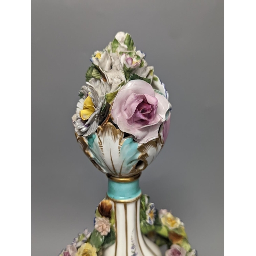 1266 - A German  porcelain floral encrusted vase and cover 35cm, pseudo crossed swords mark