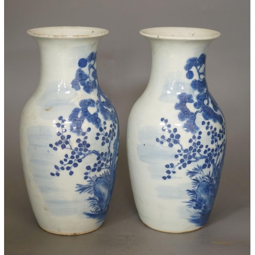 1267 - A pair of 19th century Chinese blue and white three friends of winter vases 22cm