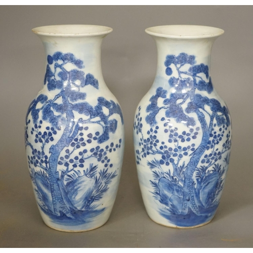 1267 - A pair of 19th century Chinese blue and white three friends of winter vases 22cm