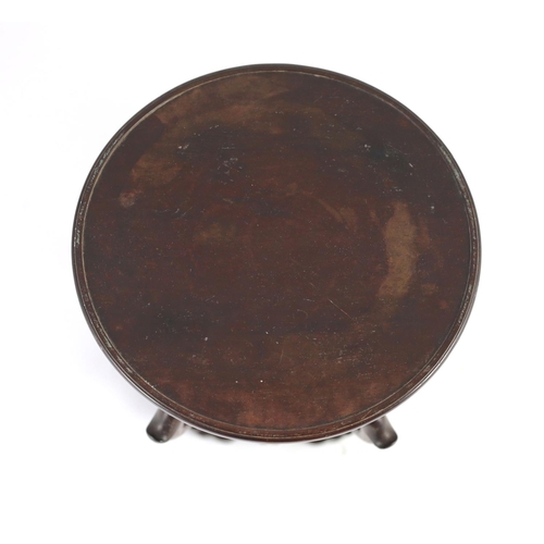 1269 - A Chinese hardwood stand, 19th century,the circular dish top above a fretted frieze, on four scrolle... 