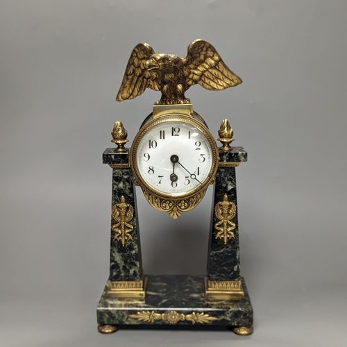 1271 - A French Empire style marble and ormolu portico timepiece  32cm