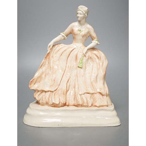 1272 - R. H. Belcher, pottery figure of a lady, 24cm