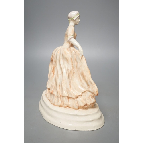 1272 - R. H. Belcher, pottery figure of a lady, 24cm