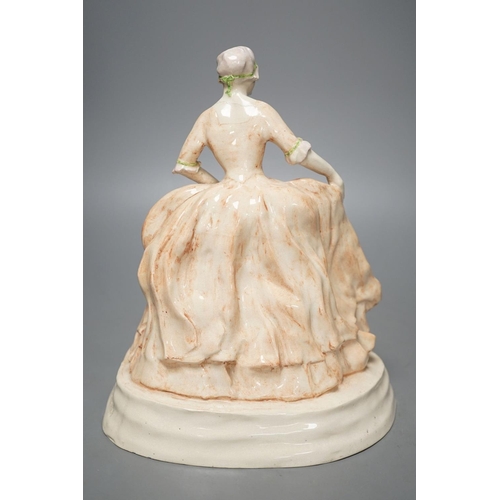 1272 - R. H. Belcher, pottery figure of a lady, 24cm