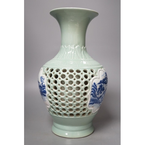 1279 - A Chinese double walled celadon ground vase, 37.5 cm high