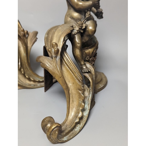 1282 - A pair of 19th century French bronze putti chenet 31cm