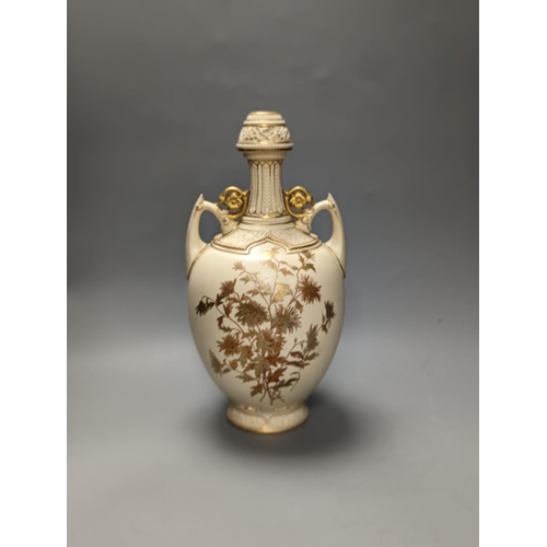 1287 - A Royal Worcester blush Ivory gilded floral ewer and a similar two handled vase 39cm