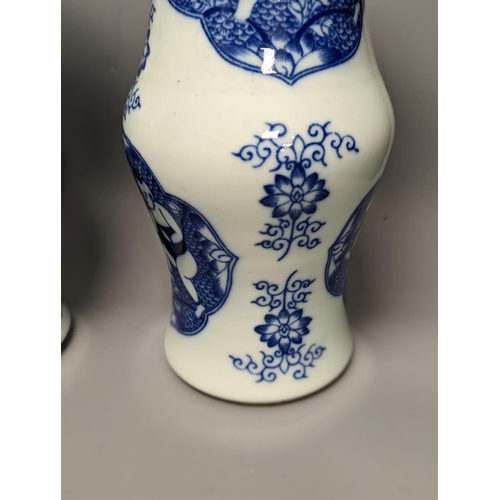 1289 - A pair of Chinese blue and white vases on stands and 6 further wood stands. Vases 35cm