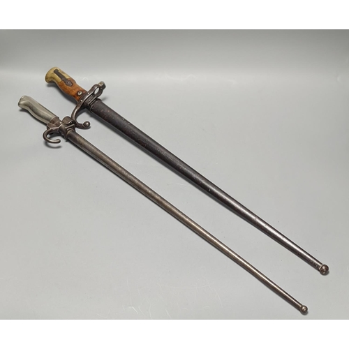 1293 - Two French bayonets, 19th century and early 20th century