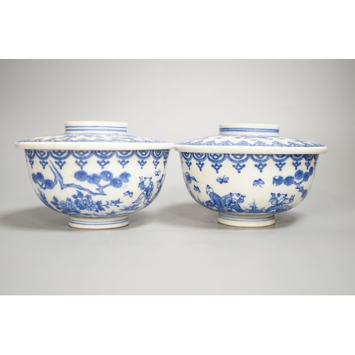 1341 - A pair of Japanese underglaze blue rice dishes and covers,Cover 13 cms diameter.