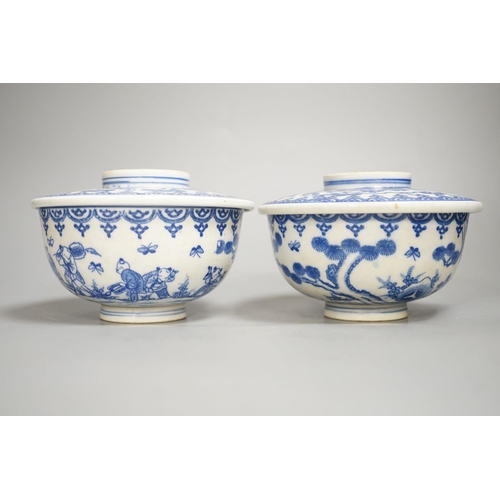 1341 - A pair of Japanese underglaze blue rice dishes and covers,Cover 13 cms diameter.