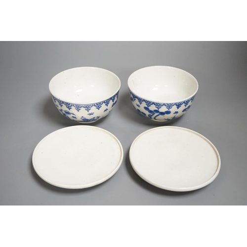 1341 - A pair of Japanese underglaze blue rice dishes and covers,Cover 13 cms diameter.