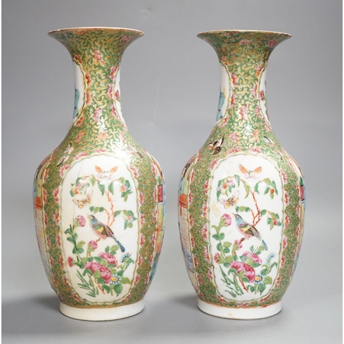 1343 - A pair of 19th century Chinese famille rose vases,24 cms high.