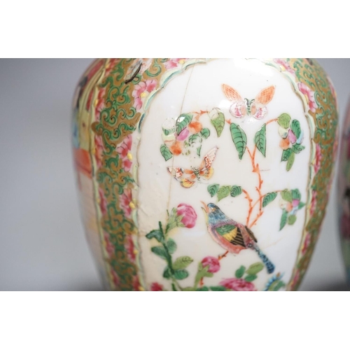 1343 - A pair of 19th century Chinese famille rose vases,24 cms high.