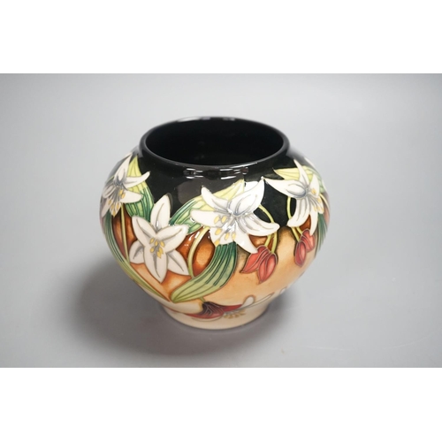 1345 - A Moorcroft squat limited edition vase signed Angi Davenport,11 cms high.