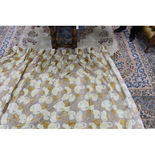 1350 - A pair of thickly woven, cut velvet, cream, beige and mushroom curtains with foliage design, trimmed... 