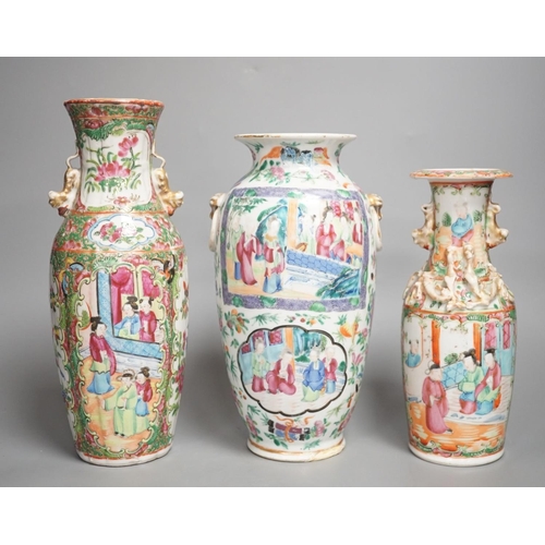 1354 - Three 19th century Chinese famille rose vases,Tallest 25 cms high.