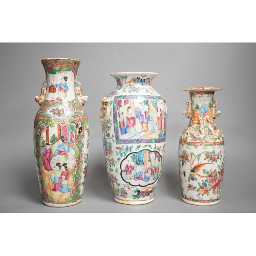 1354 - Three 19th century Chinese famille rose vases,Tallest 25 cms high.