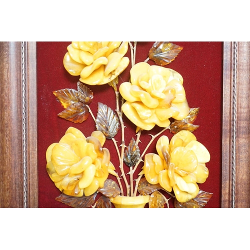 1363 - A carved amber panel from the Hermitage Museum shop, St Petersburg, roses in a vase. 49x39cm includi... 