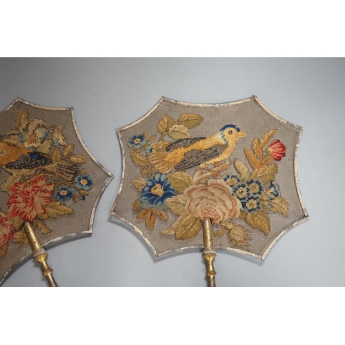 1366 - A pair of early Victorian petite point and cut steel hand screens,39 cms high.