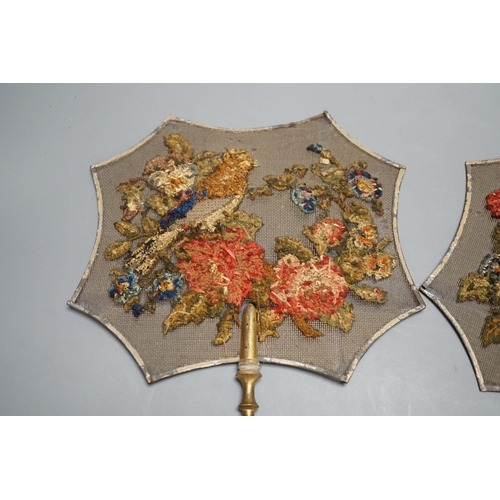 1366 - A pair of early Victorian petite point and cut steel hand screens,39 cms high.