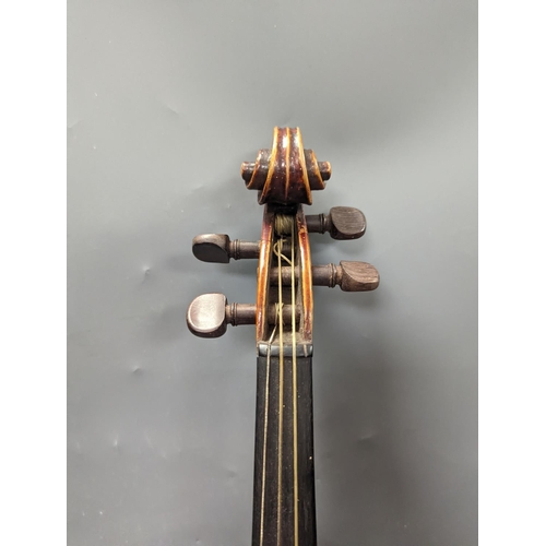 1370 - A violin in a mahogany case, case makers, Withers and sons,case 79 cms high.