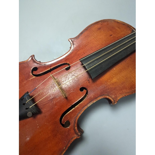 1370 - A violin in a mahogany case, case makers, Withers and sons,case 79 cms high.