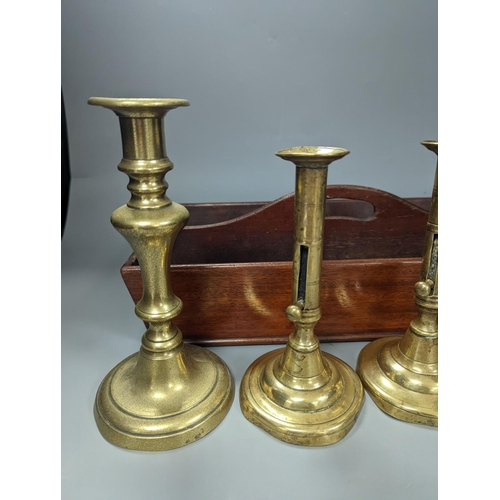 1376 - A pair of brass push-ejector candlesticks, a pair of Victorian brass candlesticks and a Victorian ma... 