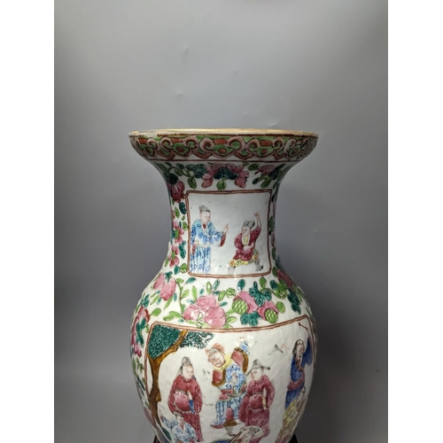 1381 - A 19th century Chinese famille rose vase on wooden stand,37 cms high including stand.... 